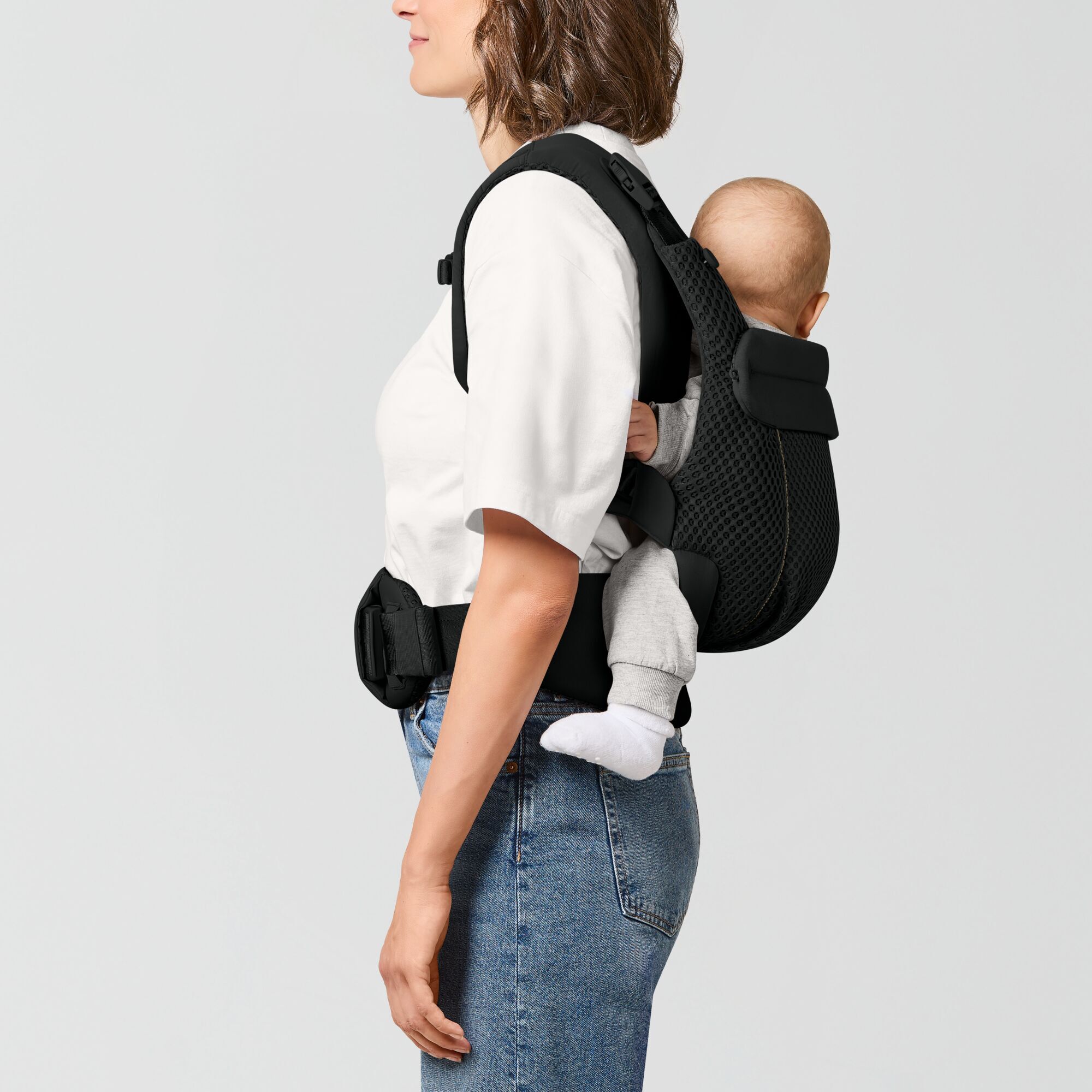 marsupio cybex per neonati colore nero indossato dietro tre posizioni