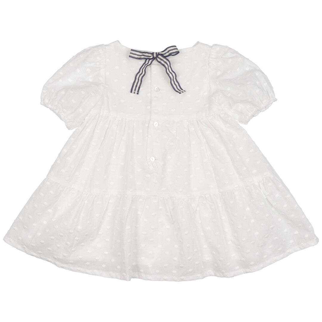 abito-colore-bianco-a-balze-per-bambina